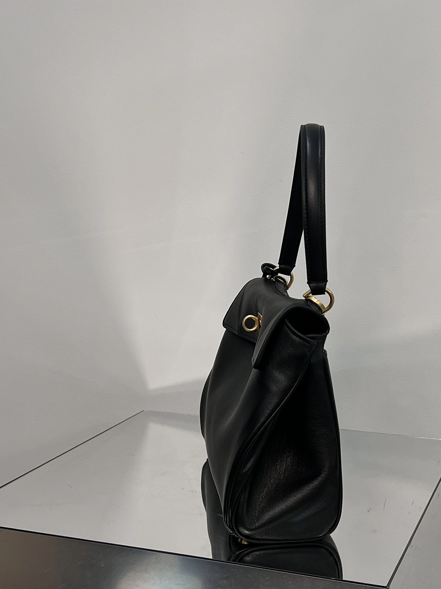 Upgraded Balenciaga 24S Black Gold Slouchy Handbag -  Elegance Redefined 72561