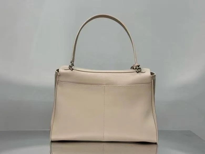 Lightweight Balenciaga Chic Apricot Handbag with Silver Buckle -  Elegance 38250