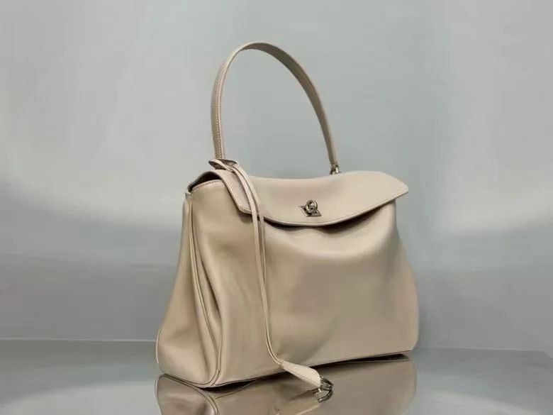 Lightweight Balenciaga Chic Apricot Handbag with Silver Buckle -  Elegance 38250