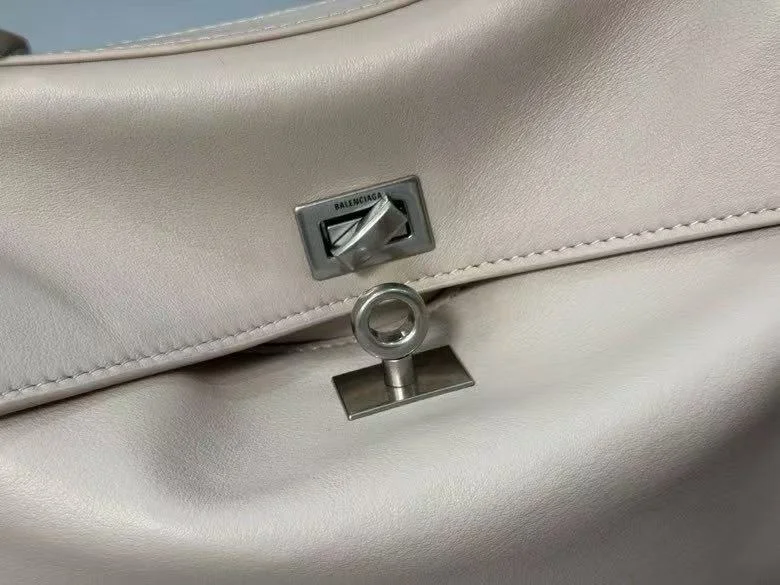 Lightweight Balenciaga Chic Apricot Handbag with Silver Buckle -  Elegance 38250
