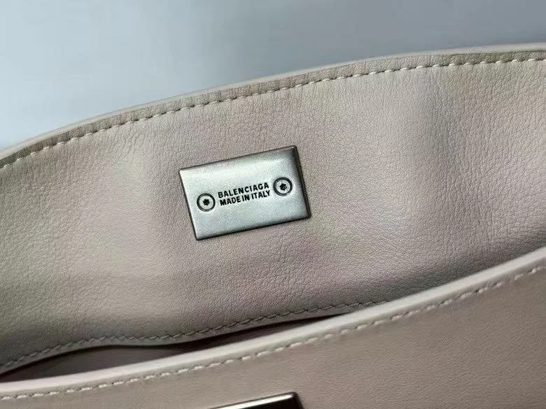Lightweight Balenciaga Chic Apricot Handbag with Silver Buckle -  Elegance 38250