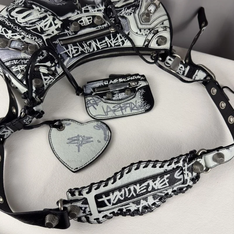 Trendsetting Balenciaga  Motorcycle-Inspired  Le Cagole Half-Moon Bag 38334