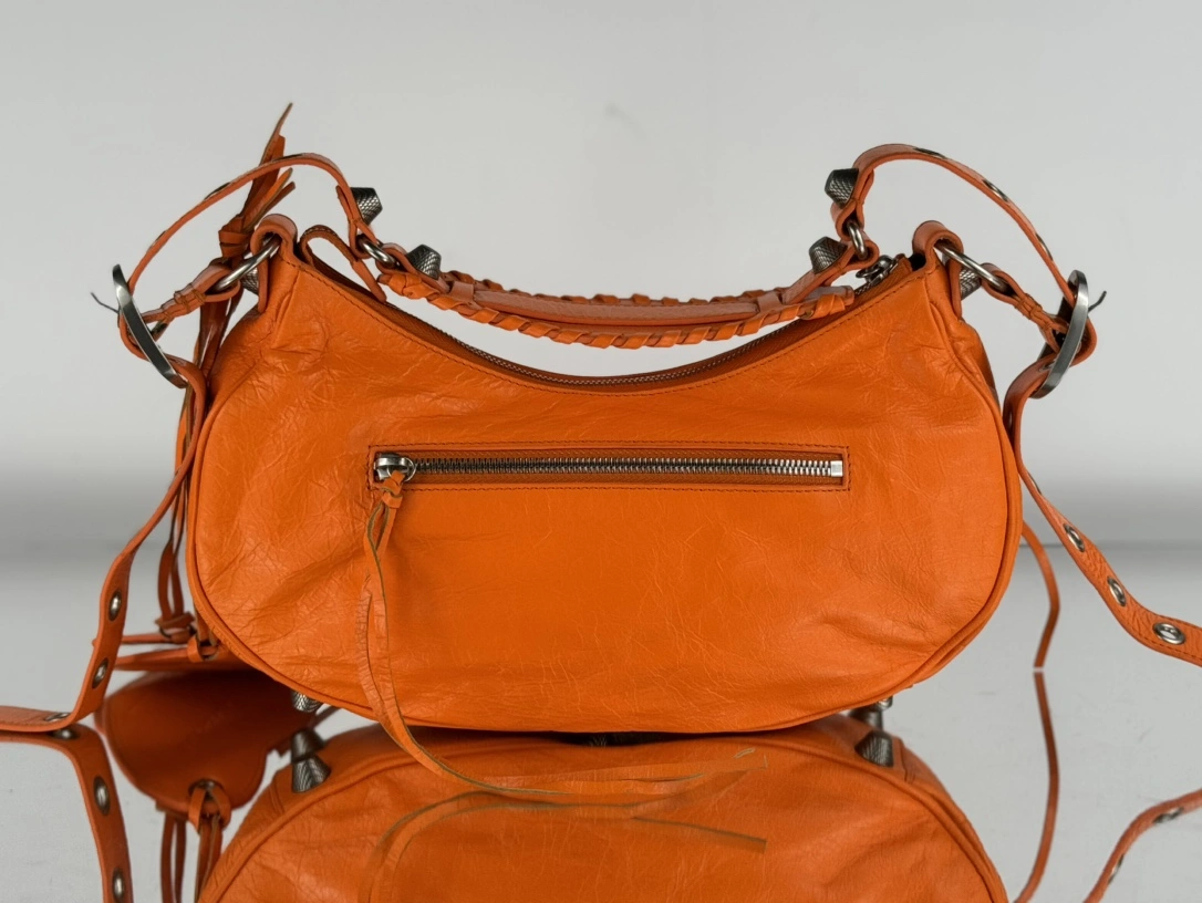 Balenciaga Le Cagole Half-Moon Dumpling Bag in Oil Wax Orange Breathable 61108
