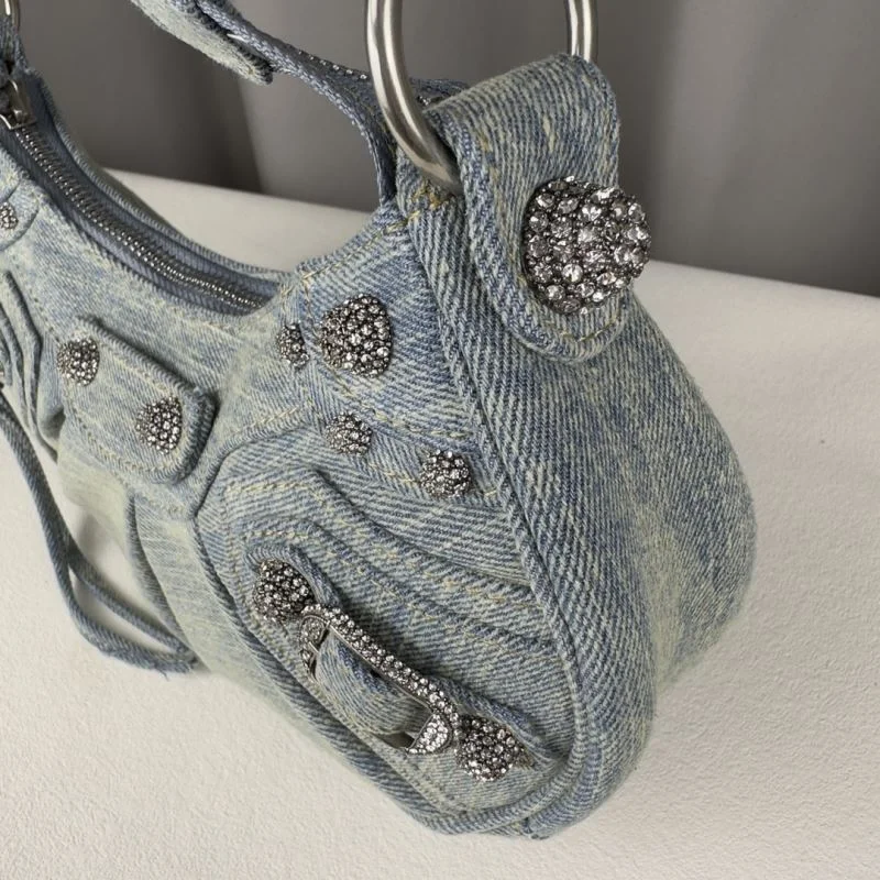 Effortless Balenciaga Le Cagole Light Blue Denim Half-Moon Crossbody Bag 38393