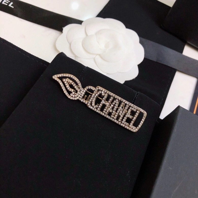 Trendsetting Chanel Brooches 220322