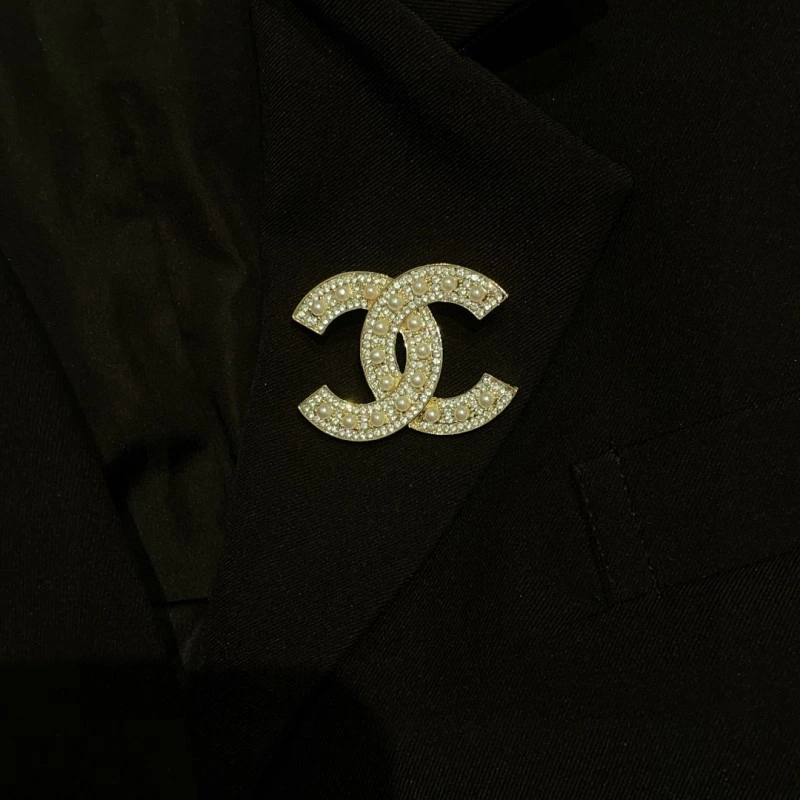 FashionForward Chanel Brooches 220324