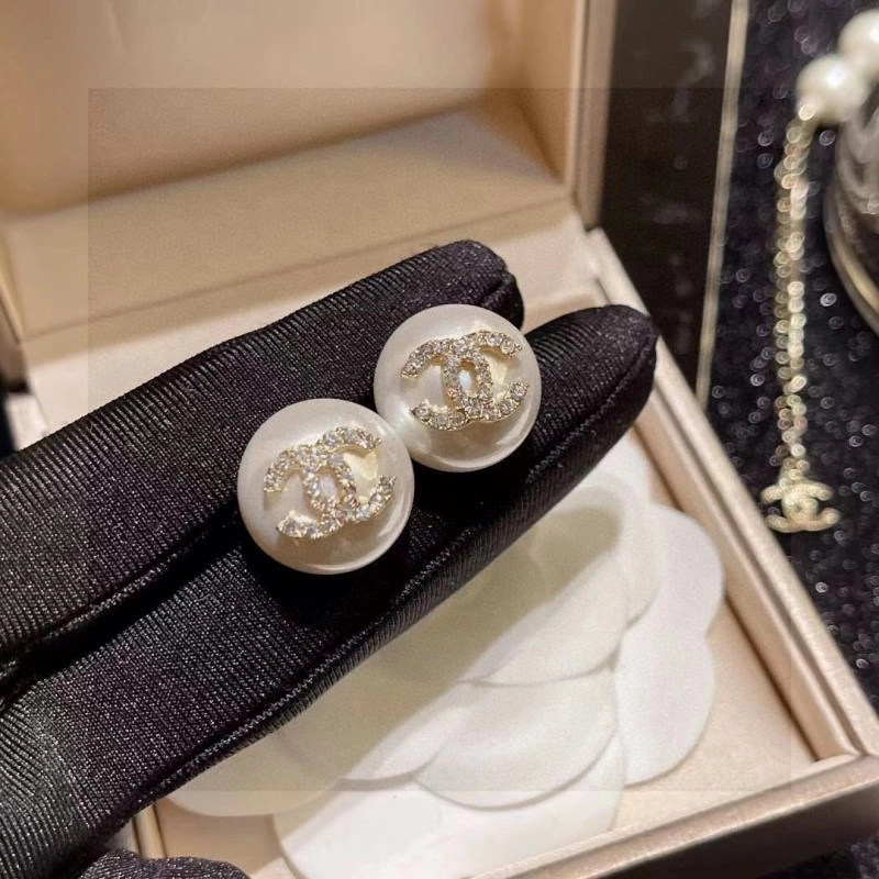 Compact Chanel Earrings 219476