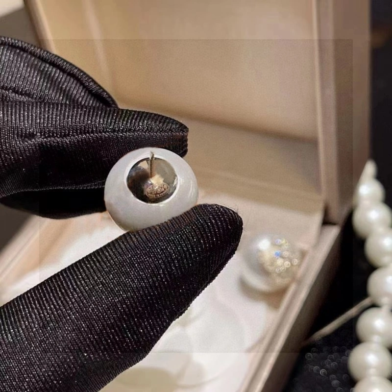 Compact Chanel Earrings 219476