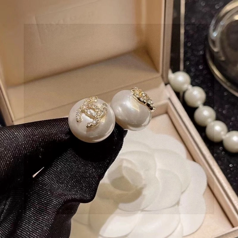 Compact Chanel Earrings 219476
