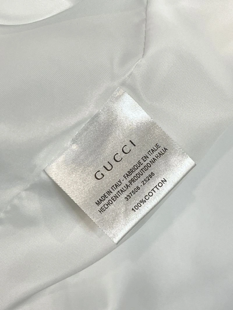 Compact Gucci Outwear 128054