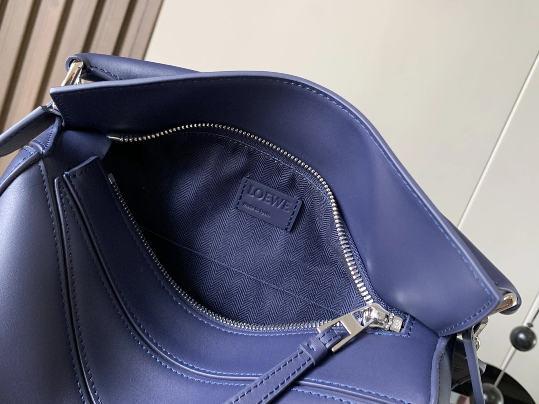 Neat Loewe Puzzle Bags 71953