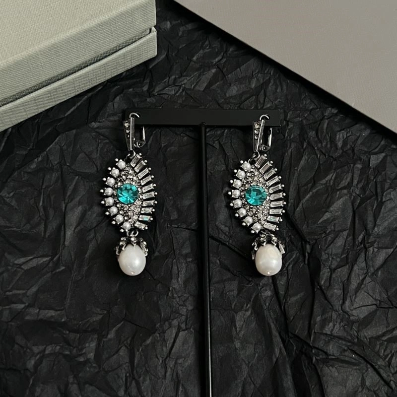 Snug Mcqueen Earrings 208629