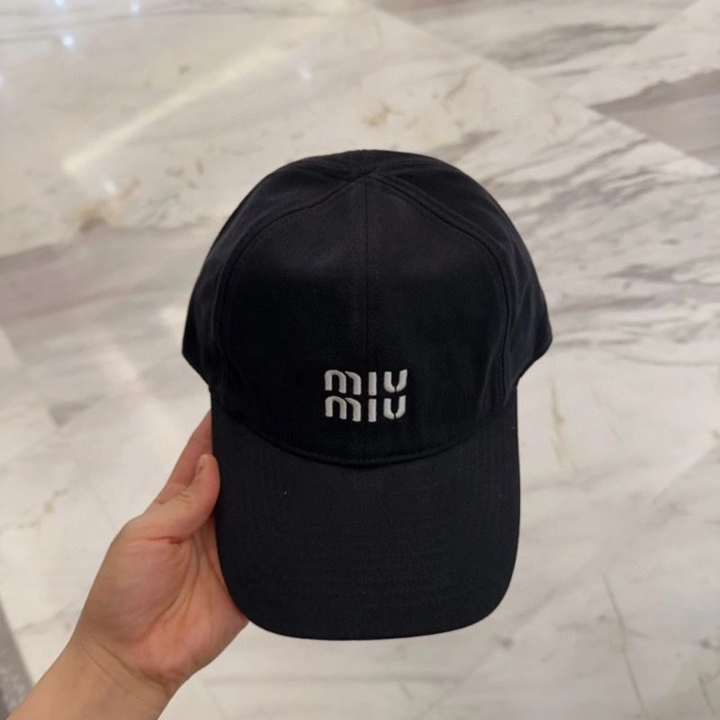 Miu Miu Caps Minimalist 257712