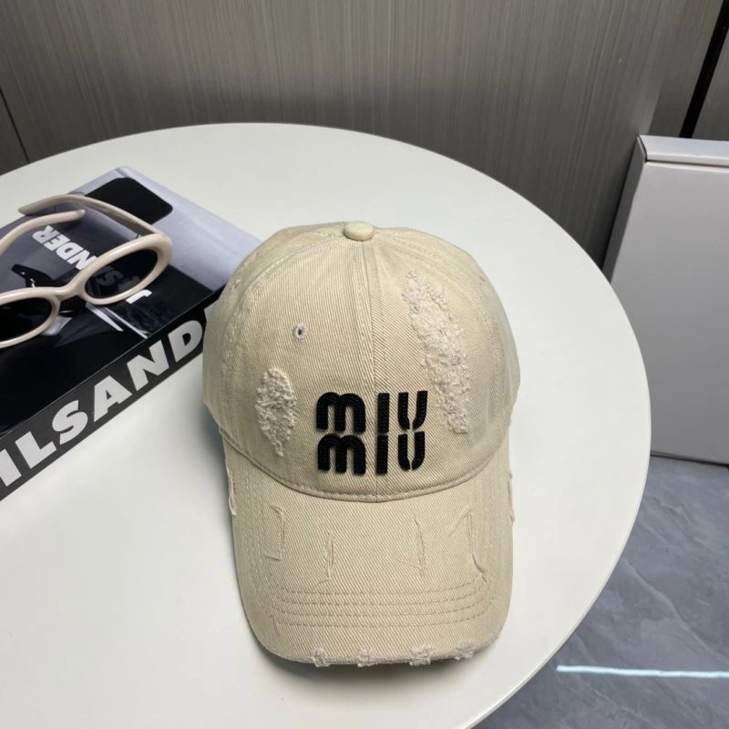 Miu Miu Caps WeatherProof 257611