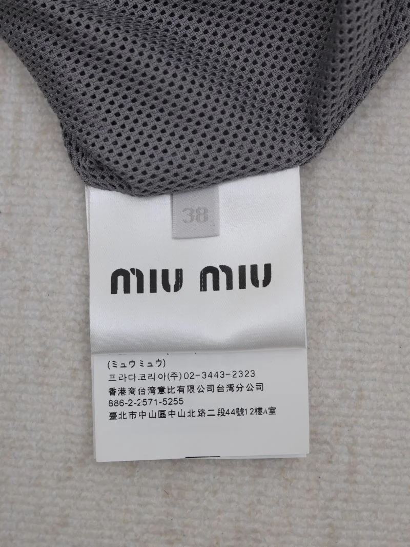 Miu Miu Outwear Sleek 163571