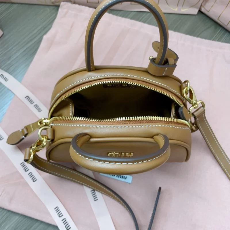 Versatile Miu Miu Top Handle Bags 43443